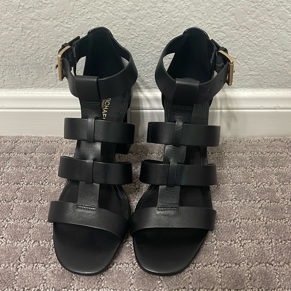 Micheal Kors. Black heel . Size 6.5